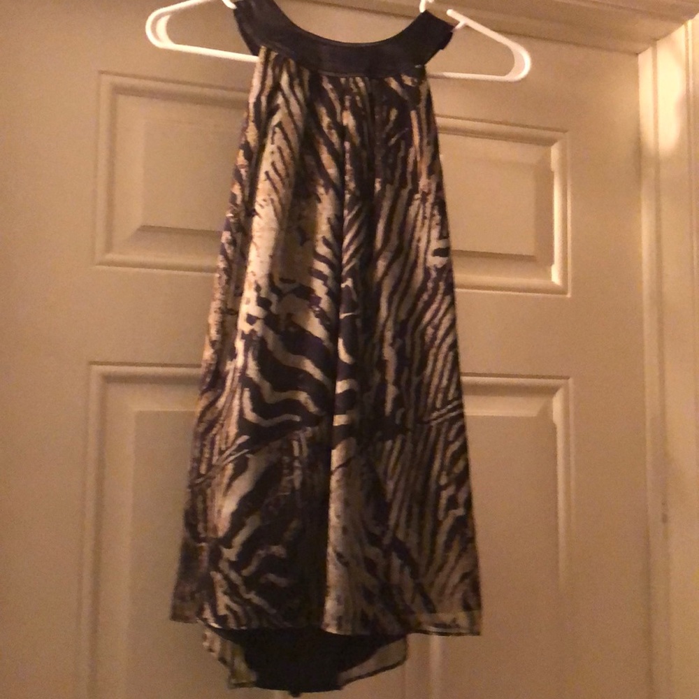 Dressy sleeveless open back shirt